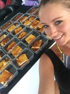 spent half a day meal prepping meals for 12 weeks and cut her grocery bill in half