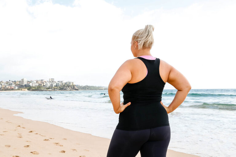 Zena-looking-up-the-beach-with-back-to-camera