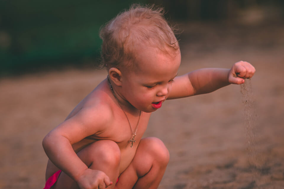 boy-playing-sand